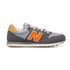 Sneakers grigie in similpelle e tessuto con logo arancione New Balance 500, Brand, SKU s323000138, Immagine 0